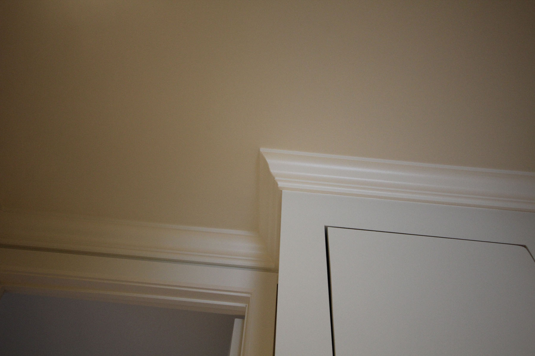 crown mouldings installation services and interior paintain services, baseboard mouldings and quart de rond.